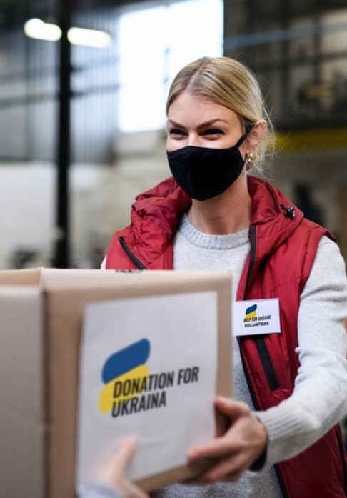 Charity worker with parcel